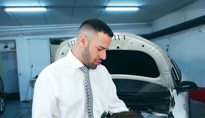 Suited Car Mechanic
